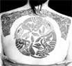Tattoo by Lal Hardy, original design by Courtney Davis
